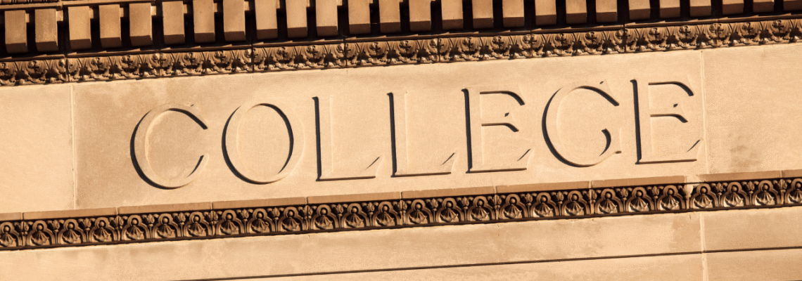 Stone building facade with ornate gold trim and the engraved word “COLLEGE” across a beige panel, framed by decorative columns and moldings.